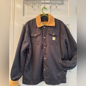 Carhartt men’s Sherpa lined Hubbard jacket 
Black snap front closure. Like new